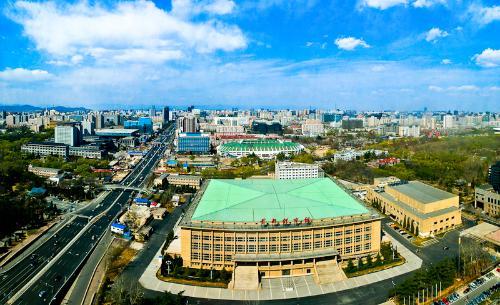 首都体育场修建时间及其历史背景与意义